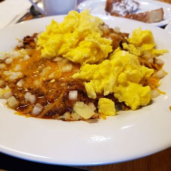The Scrambler House - Slinger... Potatoes, hamburger, chili, raw onions with eggs on top - American Near Me - O'Fallon, Missouri The Scrambler House - Slinger... Potatoes, hamburger, chili, raw onions with eggs on top - American Near Me - O'Fallon, Missouri