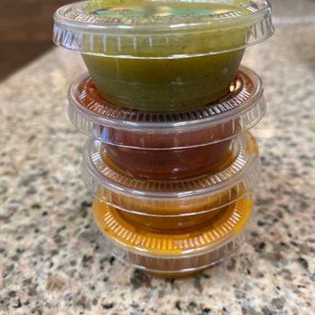 Taqueria Los Caporales - a stack of plastic containers - Mexican Near Me - Livermore, California Taqueria Los Caporales - a stack of plastic containers - Mexican Near Me - Livermore, California