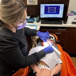 Romney Pediatric Dentistry - Jessica doing my sons cleaning