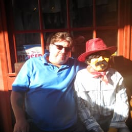 a man and a man dressed as a cowboy