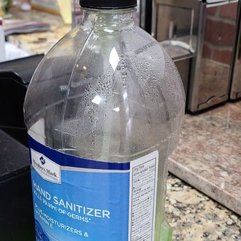 Daddyo's Pizza - a bottle of sanitizer on a counter - Pizza Near Me - Houston, Texas