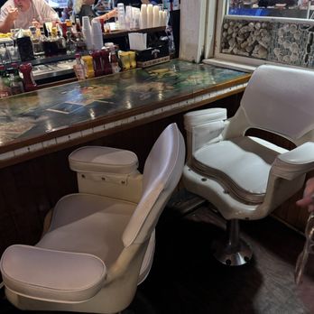 Rockefellers Raw Bar - Captain's Seats as bar stools: outstanding - Seafood Near Me - North Myrtle Beach, South Carolina Rockefellers Raw Bar - Captain's Seats as bar stools: outstanding - Seafood Near Me - North Myrtle Beach, South Carolina