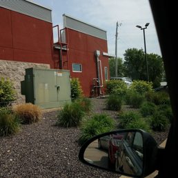a side view mirror of a building