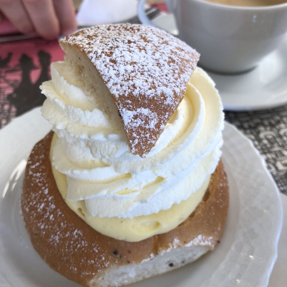Semla- Vanilla and whipped cream inside cardamom bread Semla- Vanilla and whipped cream inside cardamom bread