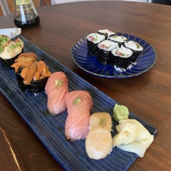 Sushi Kaunta - (Left to right) creamy scallop, uni (sea urchin), chutoro (medium fatty tuna), hotate (scallop). Shiso Ume roll. - Japanese Near Me - Kent, Washington Sushi Kaunta - (Left to right) creamy scallop, uni (sea urchin), chutoro (medium fatty tuna), hotate (scallop). Shiso Ume roll. - Japanese Near Me - Kent, Washington