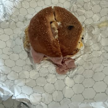Empire Bagel Factory - Untouched ham and egg bagel getting to disappear! - Coffee & Tea Near Me - Naples, Florida Empire Bagel Factory - Untouched ham and egg bagel getting to disappear! - Coffee & Tea Near Me - Naples, Florida