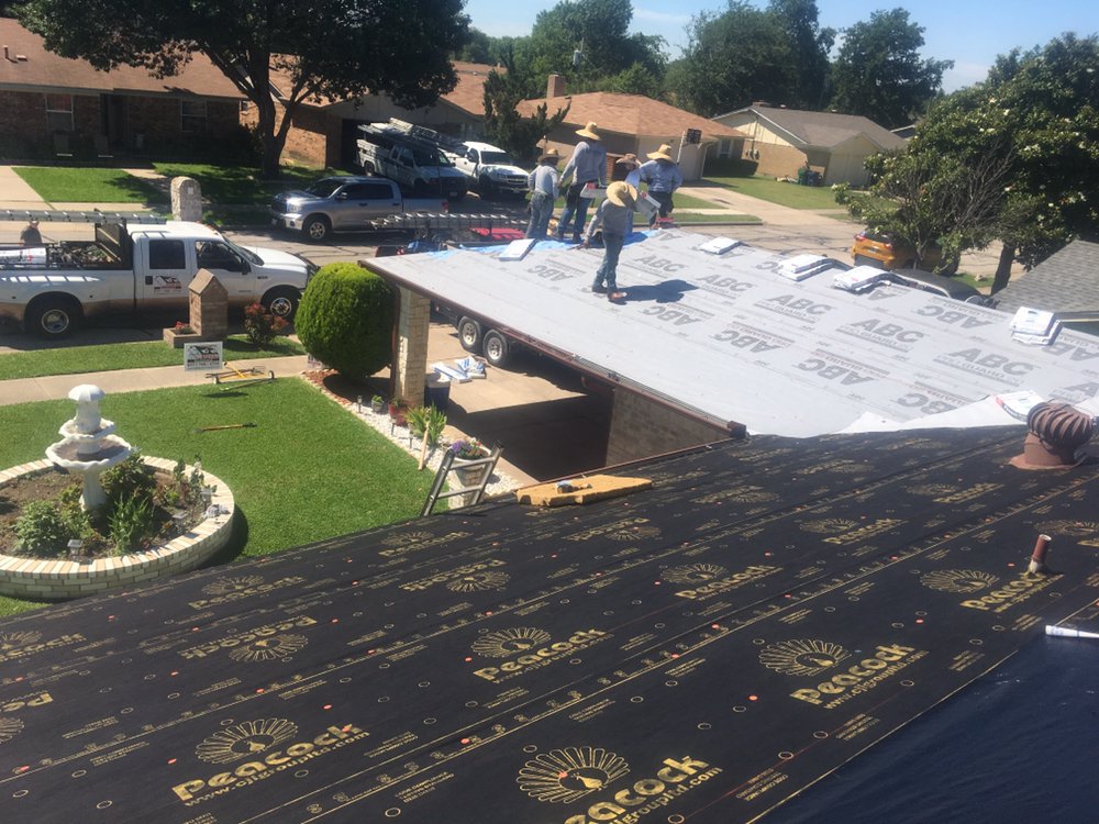 Slide of Humberto's Roofing Service