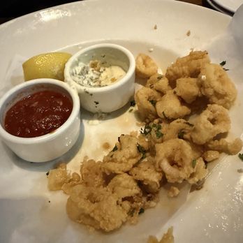 Yard House - FRIED CALAMARI (1/:3 of order) jalapeño & tomato sauces - Bars Near Me - Roseville, California Yard House - FRIED CALAMARI (1/:3 of order) jalapeño & tomato sauces - Bars Near Me - Roseville, California