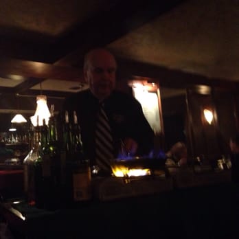 Boodles Restaurant - Making bananas foster - American Near Me - Madison Heights, Michigan Boodles Restaurant - Making bananas foster - American Near Me - Madison Heights, Michigan