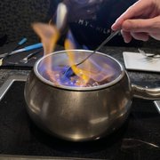 Photo of The Melting Pot - Orlando, FL, United States. Flaming Turtle