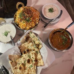 Garlic naan, veggie briyani, lamb curry Garlic naan, veggie briyani, lamb curry