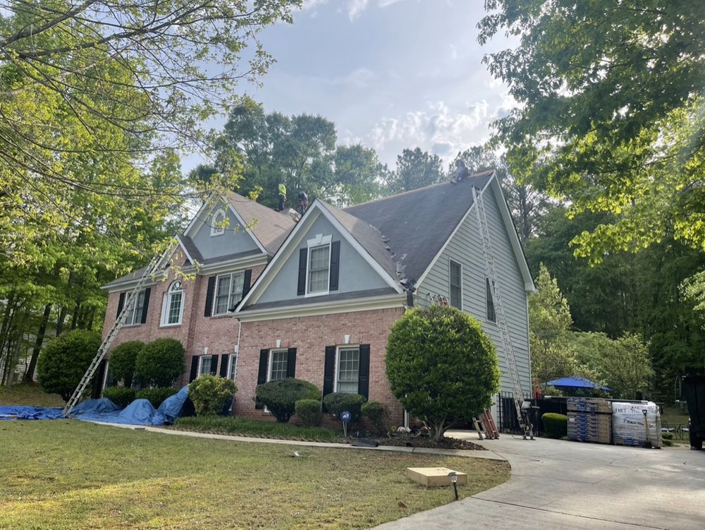 Slide of Hill Top Roofing