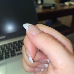 LUSH Nail Spa - Not the best lighting but the corner of my thumb is greenish yellow.