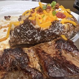 Sirloin steak, loaded baked potato Sirloin steak, loaded baked potato