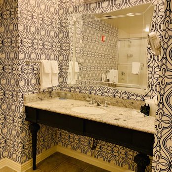 The Marker - Vanity area with marble top, deep sink, & fun wall coverings. - Hotels Near Me - San Francisco, California The Marker - Vanity area with marble top, deep sink, & fun wall coverings. - Hotels Near Me - San Francisco, California