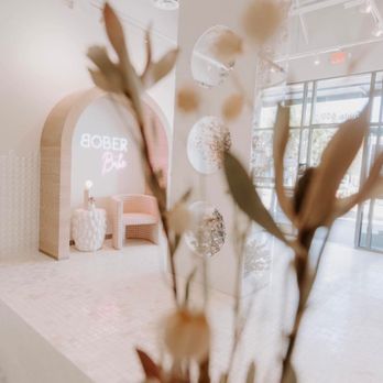 Mochi Dough - a flower in a vase in the foreground - Donuts Near Me - Folsom, California