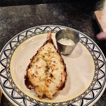 Cafe Sevilla - We ordered a lobster tail to go with our paella - Spanish Near Me - Costa Mesa, California Cafe Sevilla - We ordered a lobster tail to go with our paella - Spanish Near Me - Costa Mesa, California