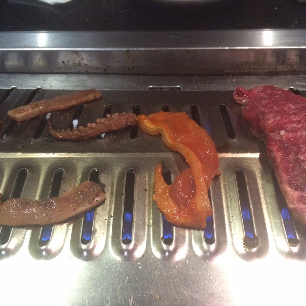 Shila Korean BBQ - Squid, spicy pork belly and beef on the grill - Barbeque Near Me - Clovis, California Shila Korean BBQ - Squid, spicy pork belly and beef on the grill - Barbeque Near Me - Clovis, California