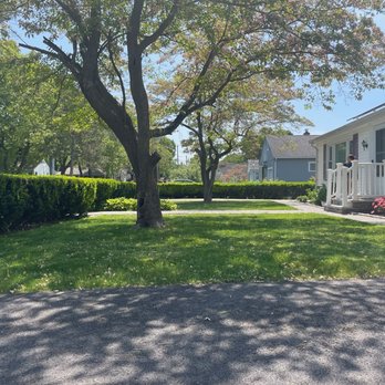 Man Mowing - Job well done! - Lawn Services Near Me