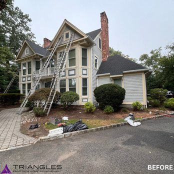 Triangle's Painting & Home Improvement - Prep in Progress! This "before" shot shows our crew setting up for a full exterior transformation on this beautiful NJ home. - Painters Near Me - Kearny, New Jersey Triangle's Painting & Home Improvement - Prep in Progress! This "before" shot shows our crew setting up for a full exterior transformation on this beautiful NJ home. - Painters Near Me - Kearny, New Jersey