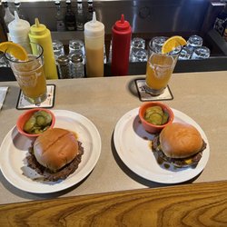 Joe Rouer's Bar - Delicious Cheese Burgers, Dill Pickle slices and (top left) Ranch Dressing!  Yum!