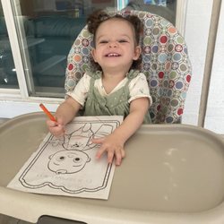 Blooming Flowers Family Child Care - Happy baby