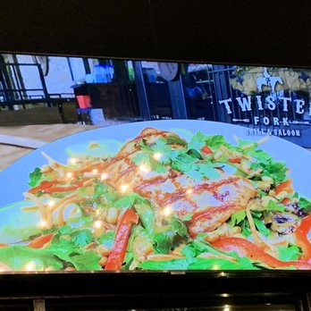 Twisted Fork Grill and Bar - TV monitor rolling the menu - American Near Me - Omaha, Nebraska