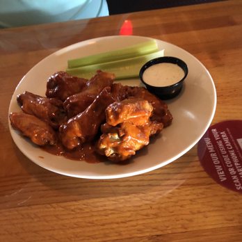 Applebee's Grill + Bar - Wings and celery - Sports Bars Near Me - Spring Hill, Florida