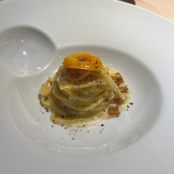 Le Calandre - smoked tagliolini with egg yolk and smoked broth - Italian Near Me - Sarmeola Di Rubano, PD