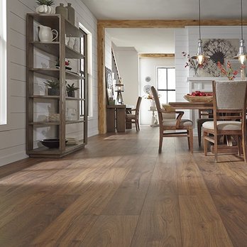LL Flooring - Jackson - a dining room with hardwood floors - Building Supplies Near Me - Jackson, Mississippi