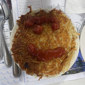 Mr. Pancake - Happy hash browns. Could use a waxing on those eyebrows. - American Near Me - Wisconsin Dells, Wisconsin