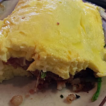 Edelweiss - Inside view of the Corn Beef Hash, Spinach, & Cheese Omelette - Breakfast & Brunch Near Me - Auburn, California