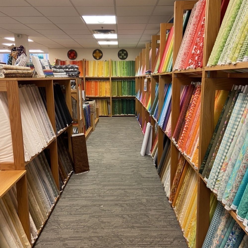 Sew Inspired Quilt Shop - The main fabric display wall - Fabric Stores Near Me - Simsbury, Connecticut Sew Inspired Quilt Shop - The main fabric display wall - Fabric Stores Near Me - Simsbury, Connecticut