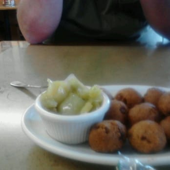 Vernon's Kuntry Katfish - This is hush puppies and pickled green tomatoes - Seafood Near Me - Conroe, Texas