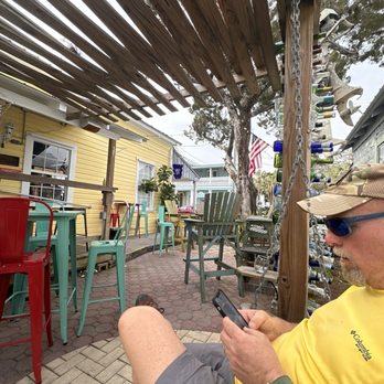 Bonish Studios - View of the courtyard toward the street. - Bars Near Me - Cedar Key, Florida