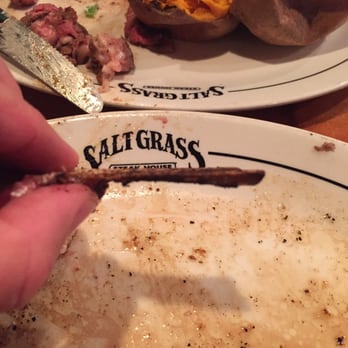 Saltgrass Steak House - The paper thin "bone" in the Cowboy Ribeye - Steakhouses Near Me - Webster, Texas Saltgrass Steak House - The paper thin "bone" in the Cowboy Ribeye - Steakhouses Near Me - Webster, Texas