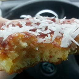 Pineapple fritter with coconut. My once a year fav. Pineapple fritter with coconut. My once a year fav.