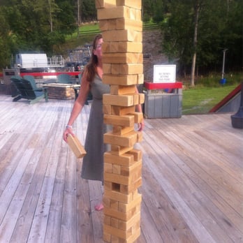 Massanutten Base Camp - Maggie playing Super Jenga - Bars Near Me - Massanutten, Virginia Massanutten Base Camp - Maggie playing Super Jenga - Bars Near Me - Massanutten, Virginia