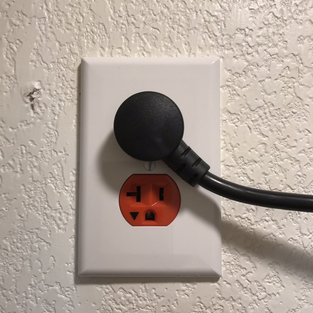 Strong Tower Electric - an electrical outlet on a wall - Electricians Near Me - Austin, Texas Strong Tower Electric - an electrical outlet on a wall - Electricians Near Me - Austin, Texas