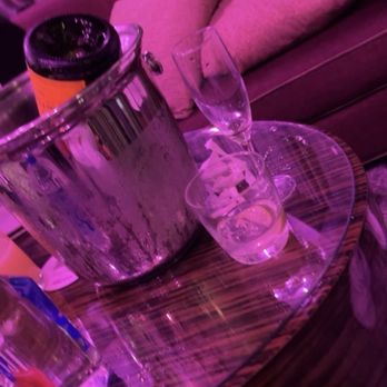 Blossom - a glass of wine and ice bucket - Lounges Near Me - Oxon Hill, Maryland Blossom - a glass of wine and ice bucket - Lounges Near Me - Oxon Hill, Maryland