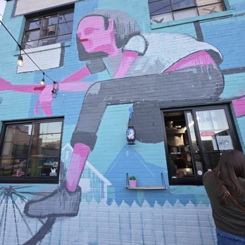Food Hut RKE - A mural painted on the wall where the kitchen of the restaurant is located. - Comfort Food Near Me - Roanoke, Virginia