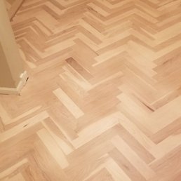 a hardwood floor with a herring pattern