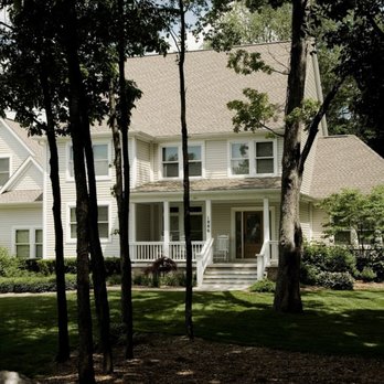 Baiardi Construction - a house in the woods - General Contractors Near Me
