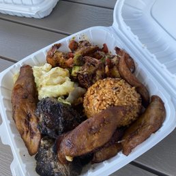 Combo plate: Super tender and flavorful Jerk Chicken with sautéed shrimp with veggies, fried cabbage, and plantains. MUST TRY!! Combo plate: Super tender and flavorful Jerk Chicken with sautéed shrimp with veggies, fried cabbage, and plantains. MUST TRY!!