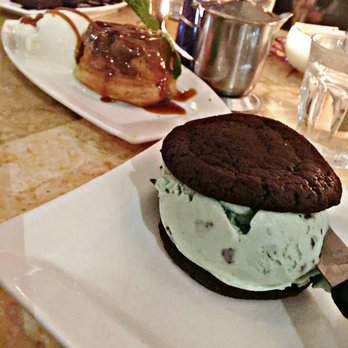 Mua - Mint chocolate chip ice cream sandwich, and pineapple upside down cake with coconut ice cream - Bars Near Me - Oakland, California