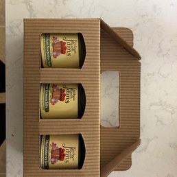 two bottles of wine in a cardboard box