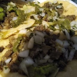 Carne asada with cilantro, avocado, onions and cilantro. Carne asada with cilantro, avocado, onions and cilantro.