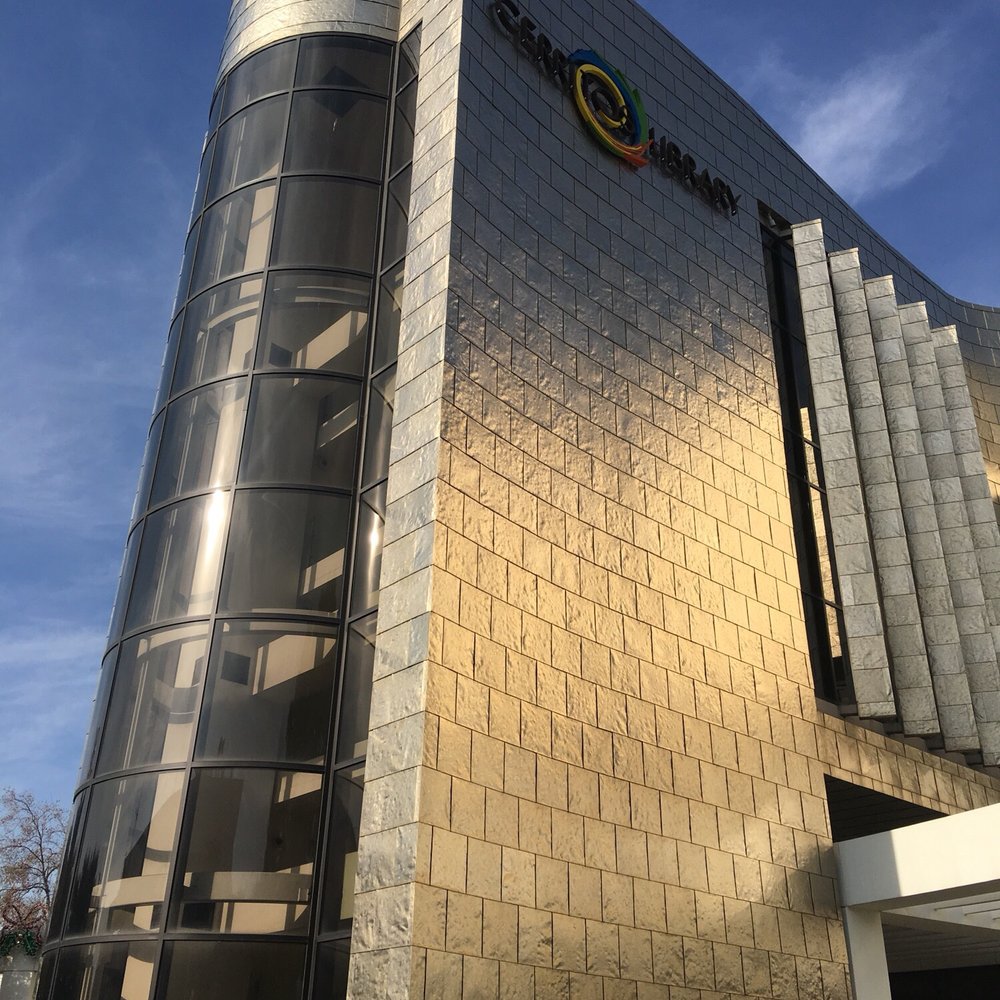 Cerritos Library - The facade changes color with different lighting - Libraries Near Me - Cerritos, California