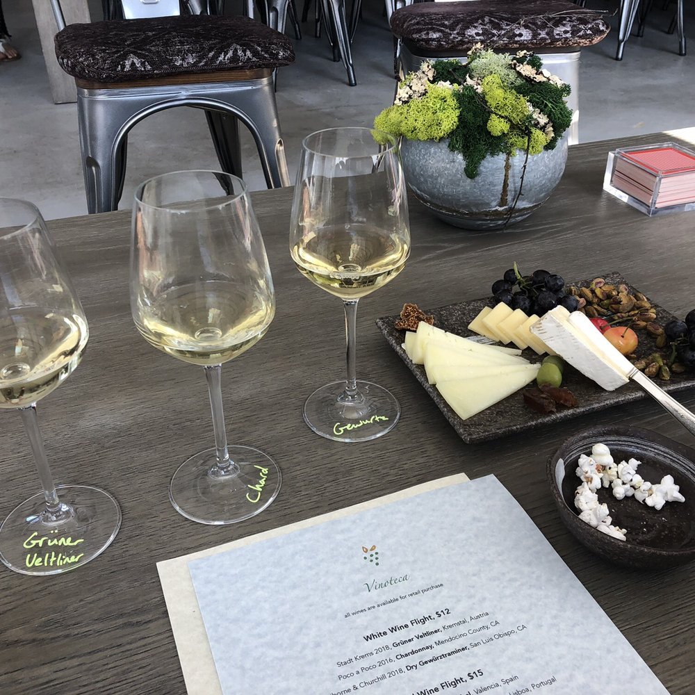 Vinoteca - White wine tasting with cheese board - Wine Tasting Room Near Me - Half Moon Bay, California