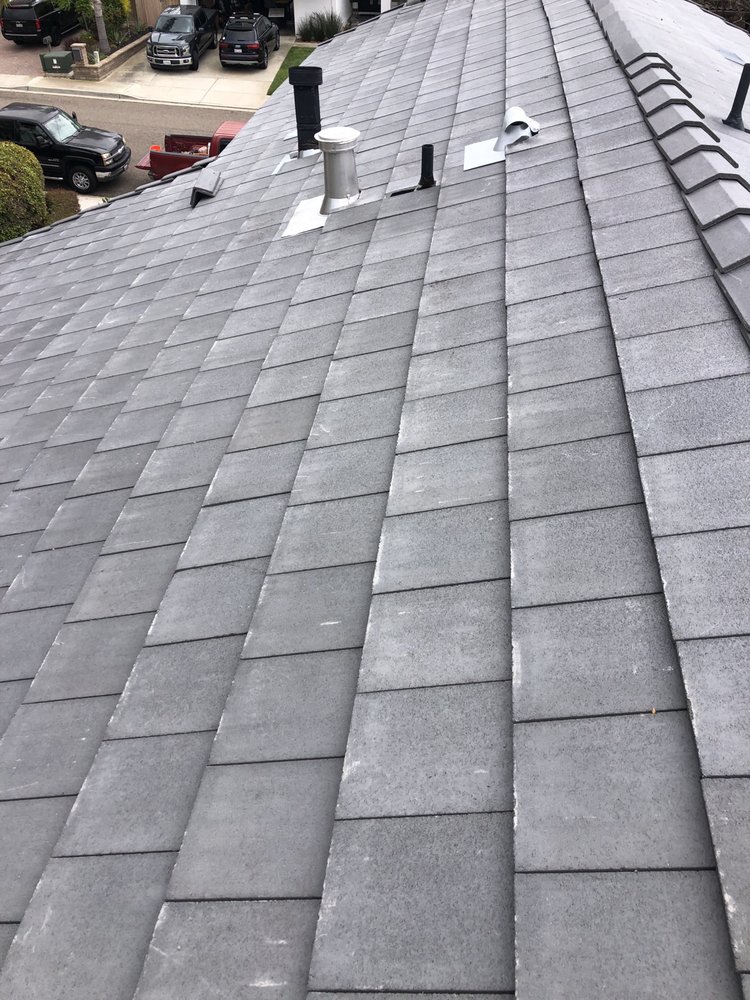 Slide of Escamilla’s Roofing and Rain Gutters